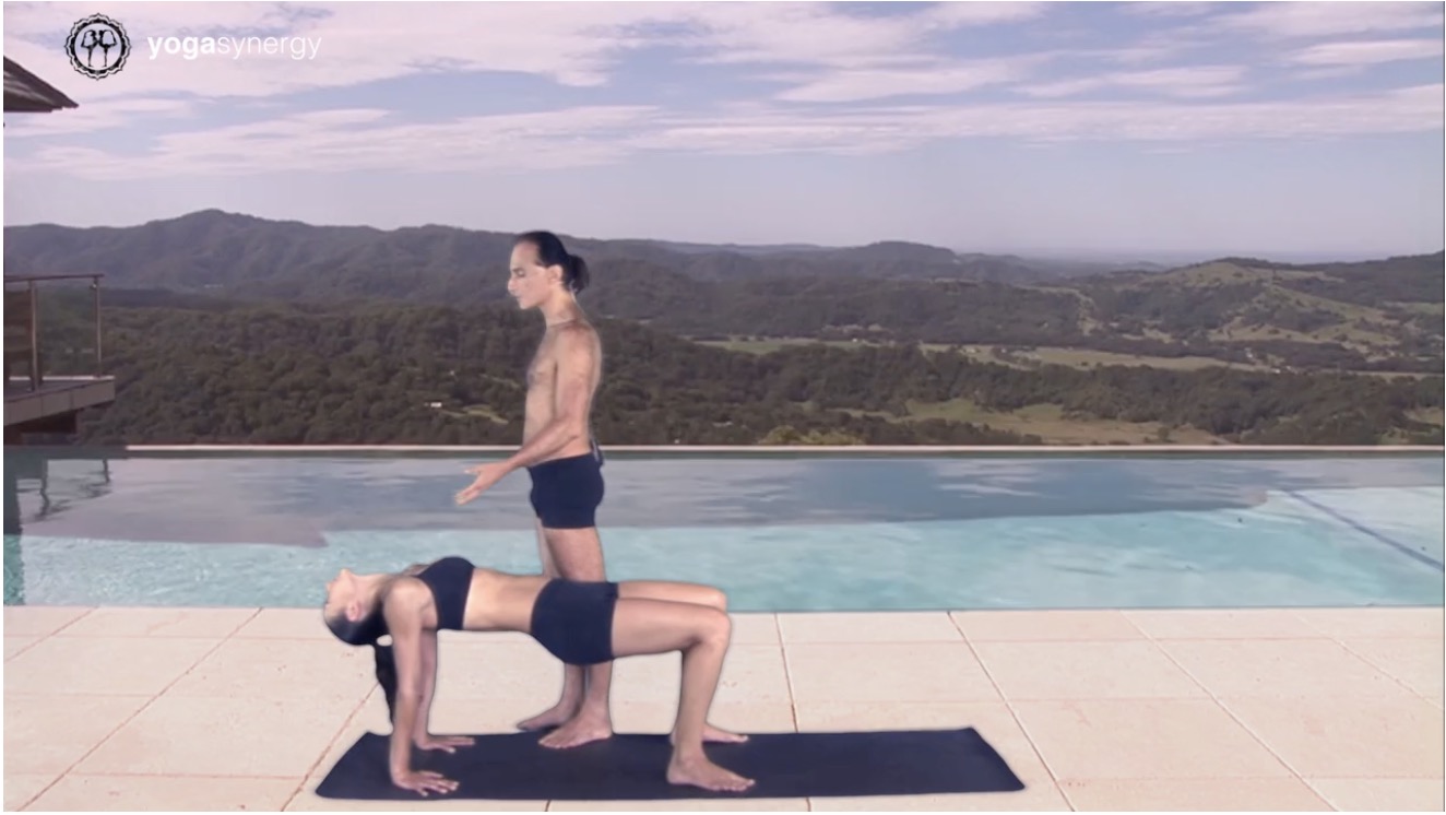 Simon Borg-Olivier and Kim Wainer teachin yoga postures in the Ashtanga Vinyasa online yoga course they teach